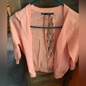 3/4 length sleeves light sweater. Light peach. Lace back.